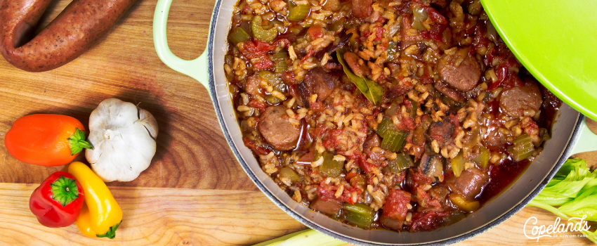 COJ - A pot of jambalaya surrounded by its ingredients